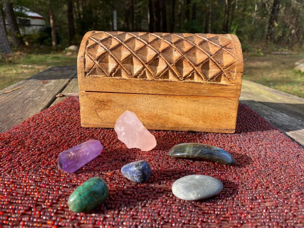 Worry stones in front of a chest
